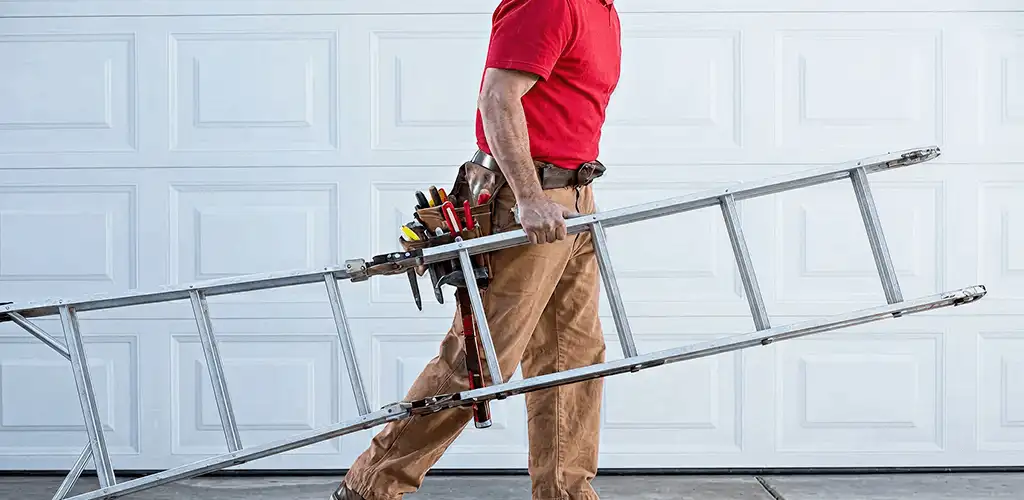 Garage door repair technician arriving with tools and ladder in Yonkers, NY