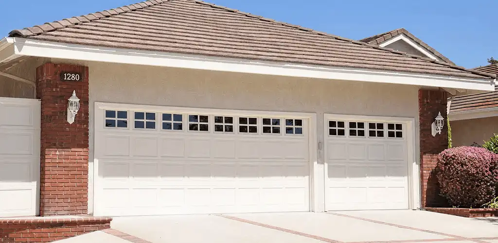 Residential garage door repair service for a double garage door in Yonkers, NY
